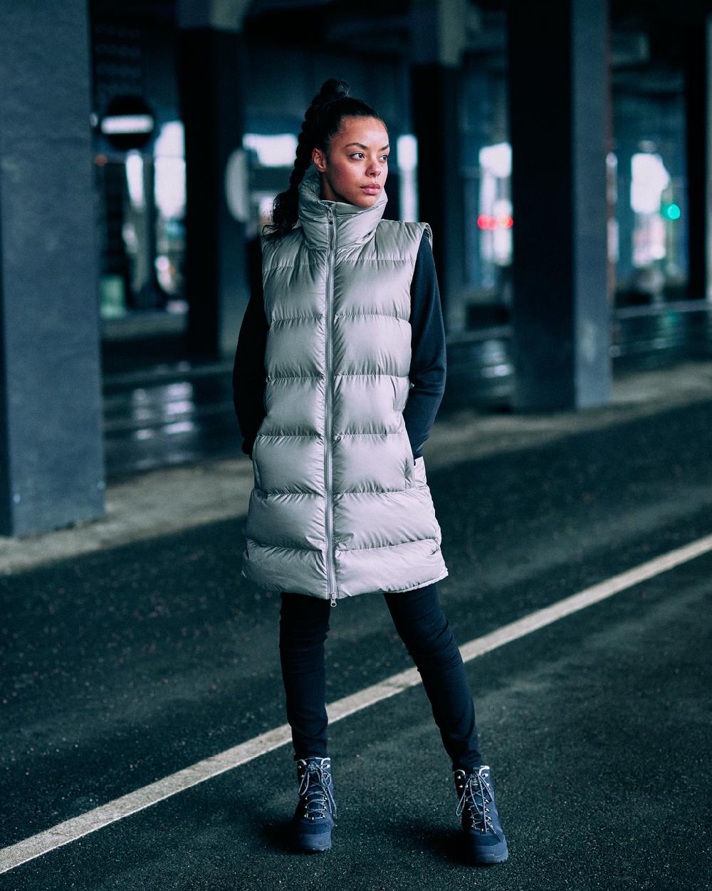 Black Coloured Helly Hansen Womens Lifa Merino Midweight Half-Zip Base Layer on blurry background