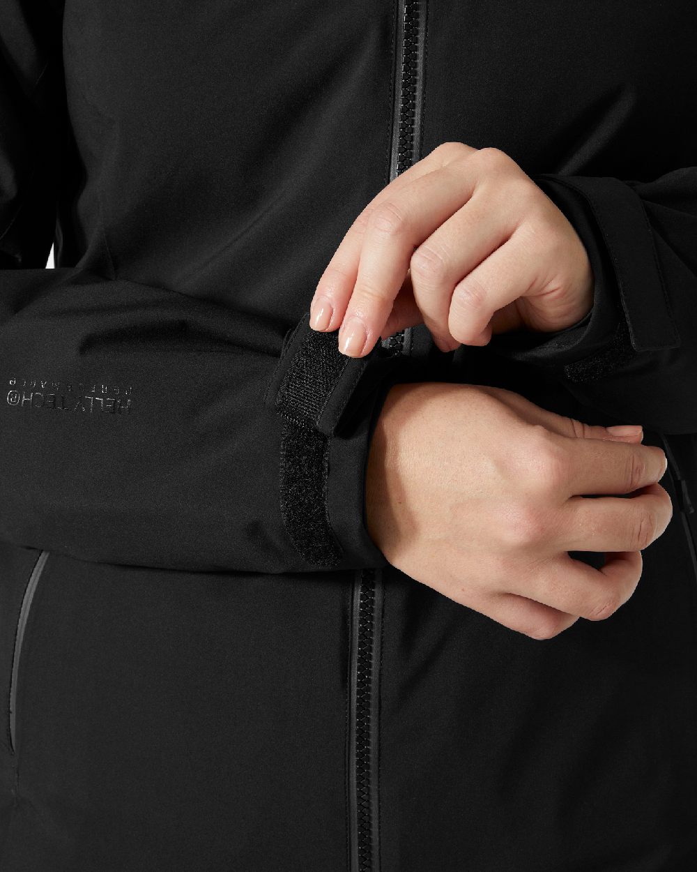 Black Coloured Helly Hansen Womens Motionista Lifaloft Ski Jacket on white background