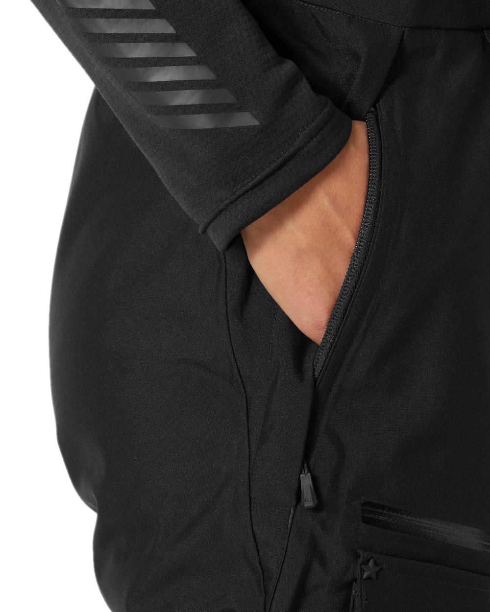 Black Coloured Helly Hansen Womens Powderqueen Bib Pant on white background