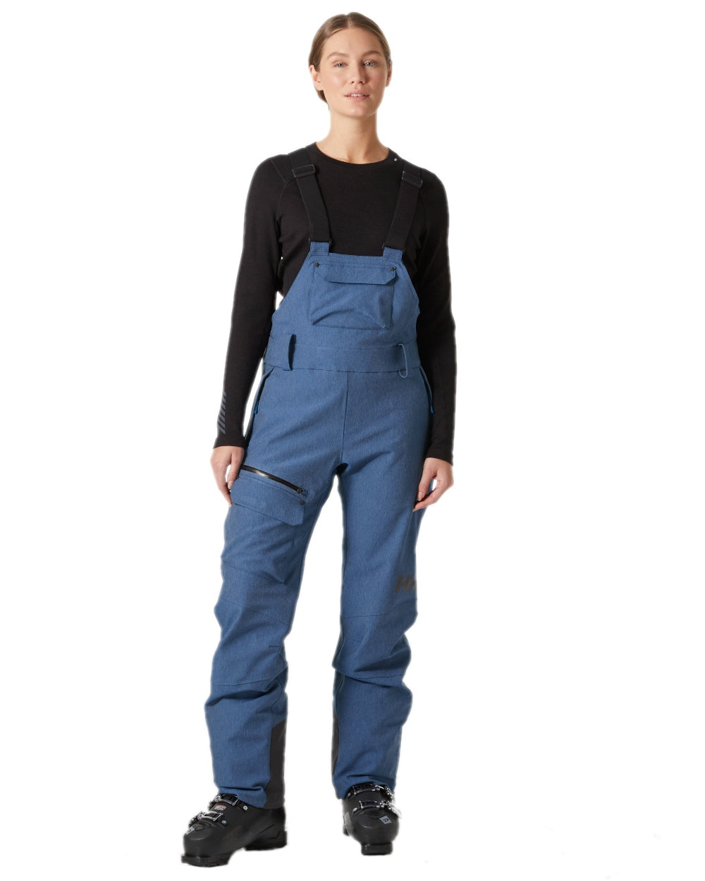 Deep Fjord Denim Coloured Helly Hansen Womens Powderqueen Bib Pant on white background