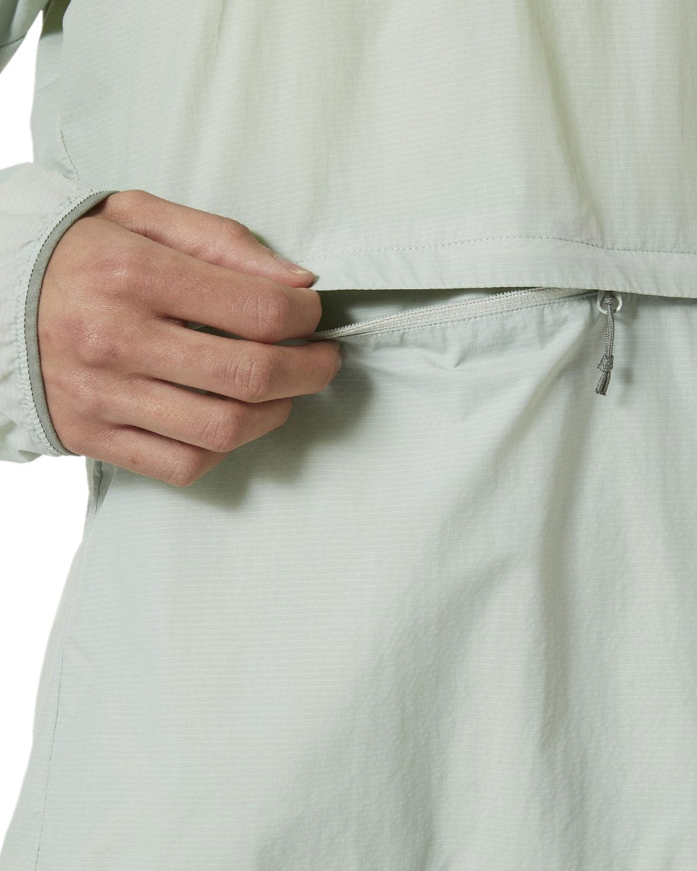 Green Mist coloured Helly Hansen Womens Roam Wind Anorak on white background