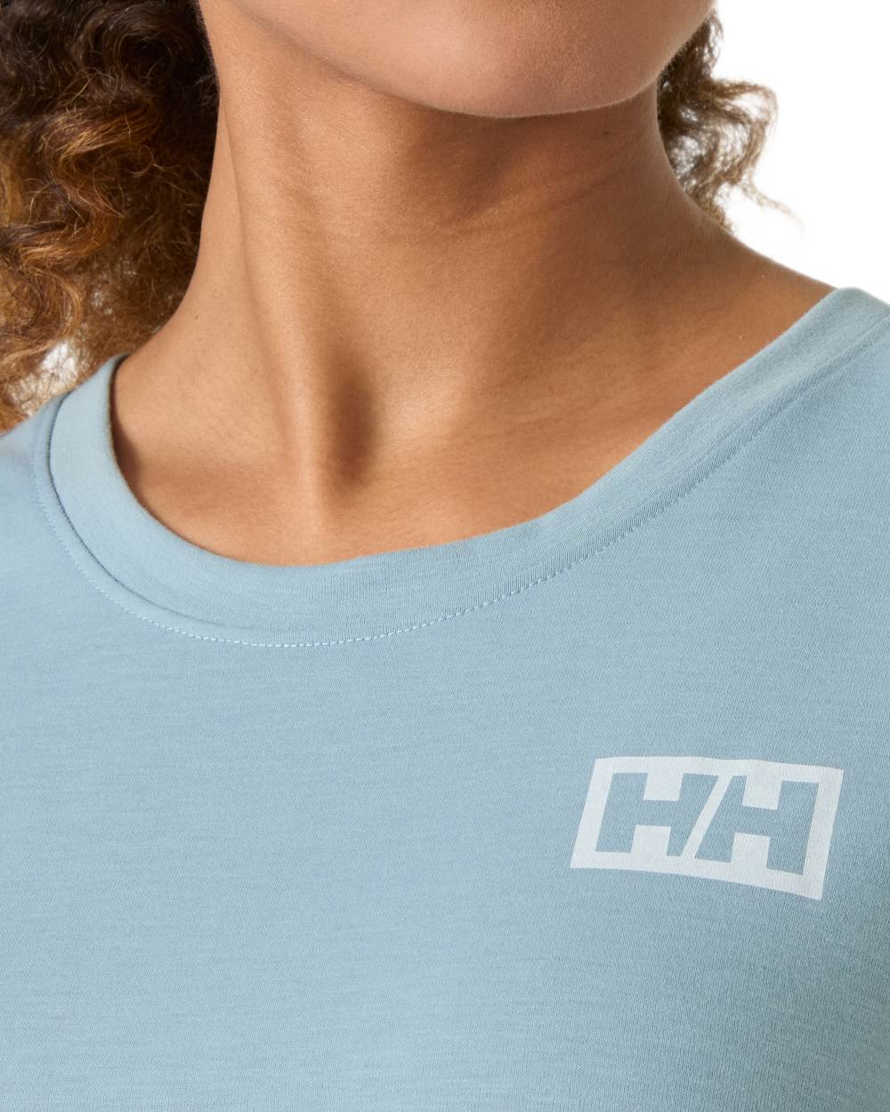 Windy Blue coloured Helly Hansen Womens Skog Recycled Graphic T-Shirt on white background
