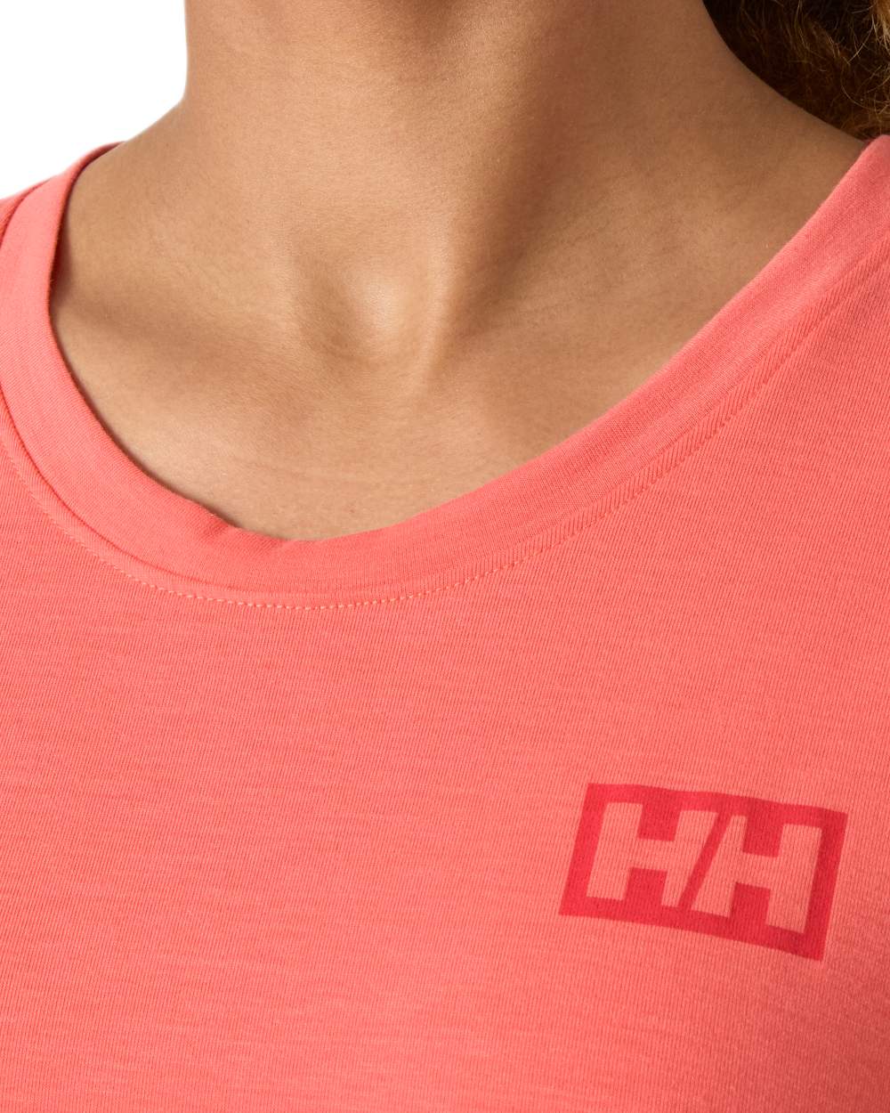 Sunset Pink coloured Helly Hansen Womens Skog Recycled Graphic T-Shirt on white background