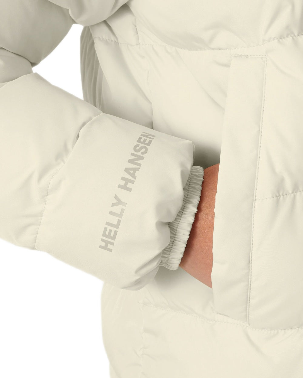 Cream Coloured Helly Hansen Womens YU 23 Reversible Puffer Jacket on white background