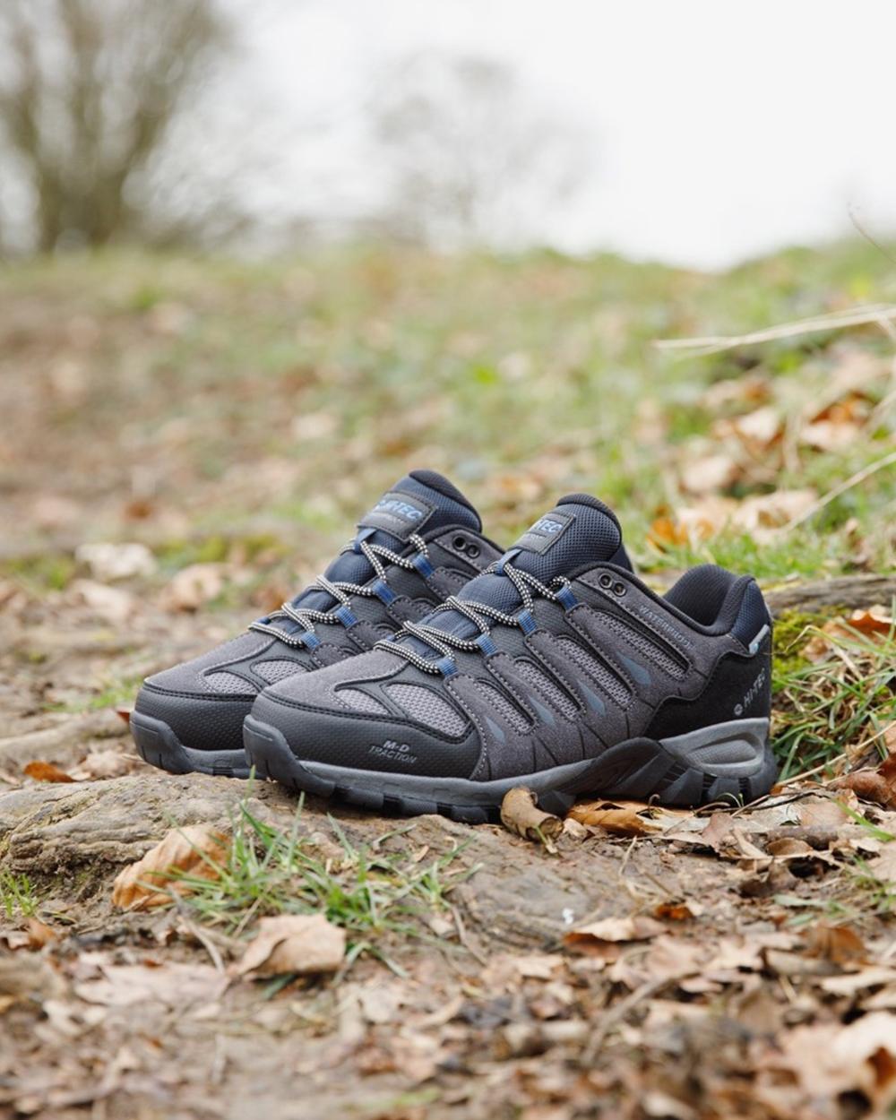 Charcoal coloured Hi-Tec Mens Corzo Low Boots on trail background