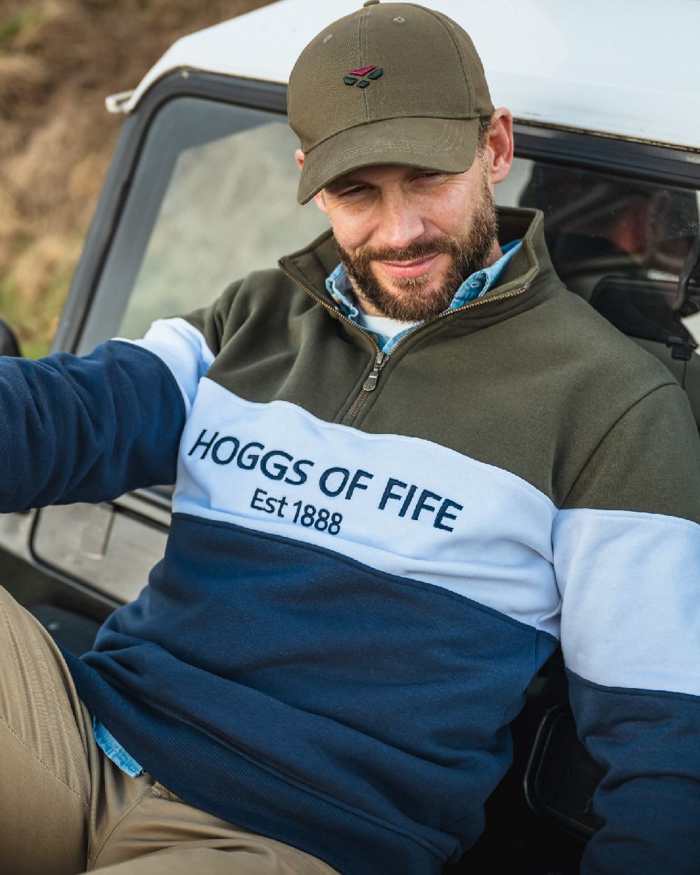 Olive Coloured Hoggs of Fife 1888 Baseball Cap on car background