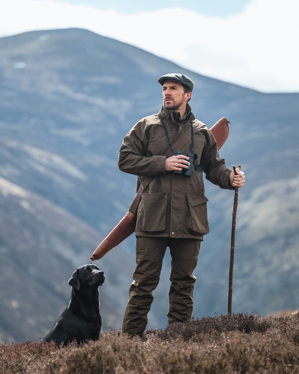 Green Coloured Hoggs of Fife Ballater Waterproof Field Trousers on mountain background