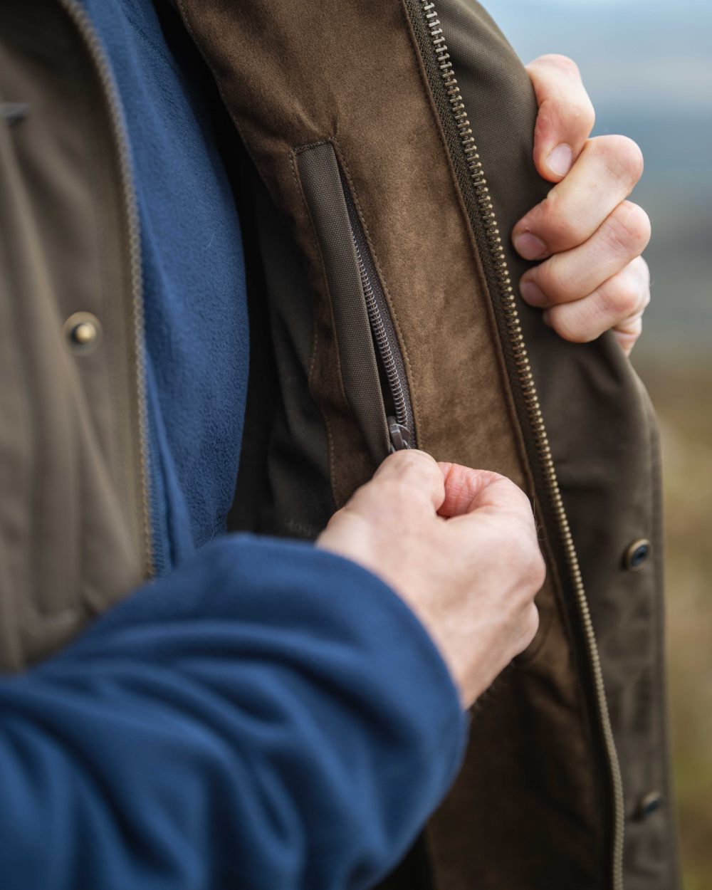 Green Coloured Hoggs of Fife Ballater Waterproof Field Waistcoat on outdoor background