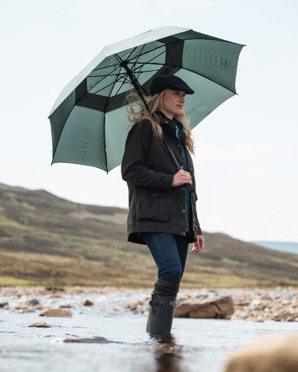 Antique Olive Coloured Hoggs of Fife Caledonia Ladies Antique Wax Jacket on outdoor background