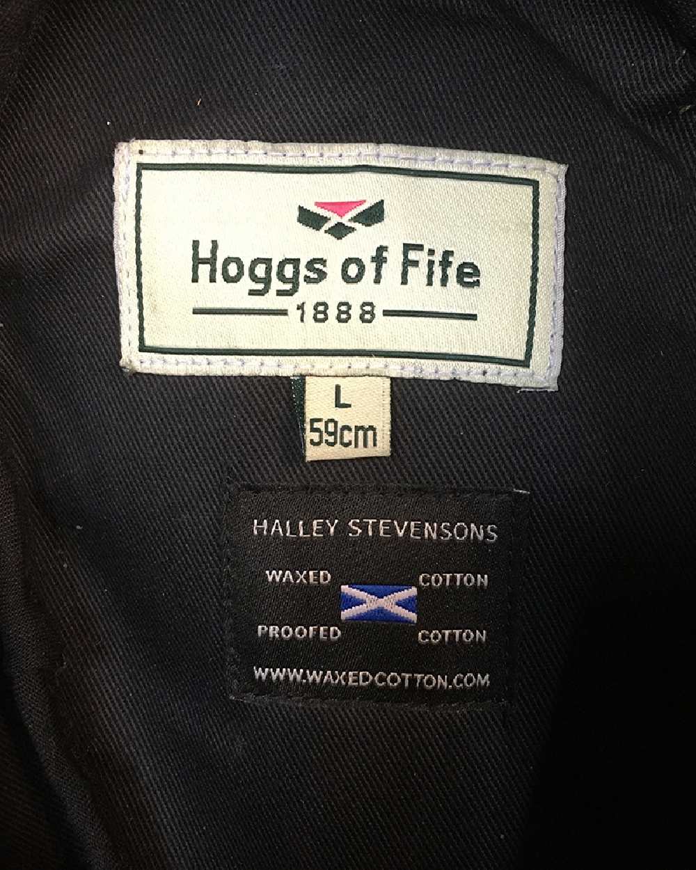 Antique Olive Coloured Hoggs of Fife Caledonia Waxed Hat on white background