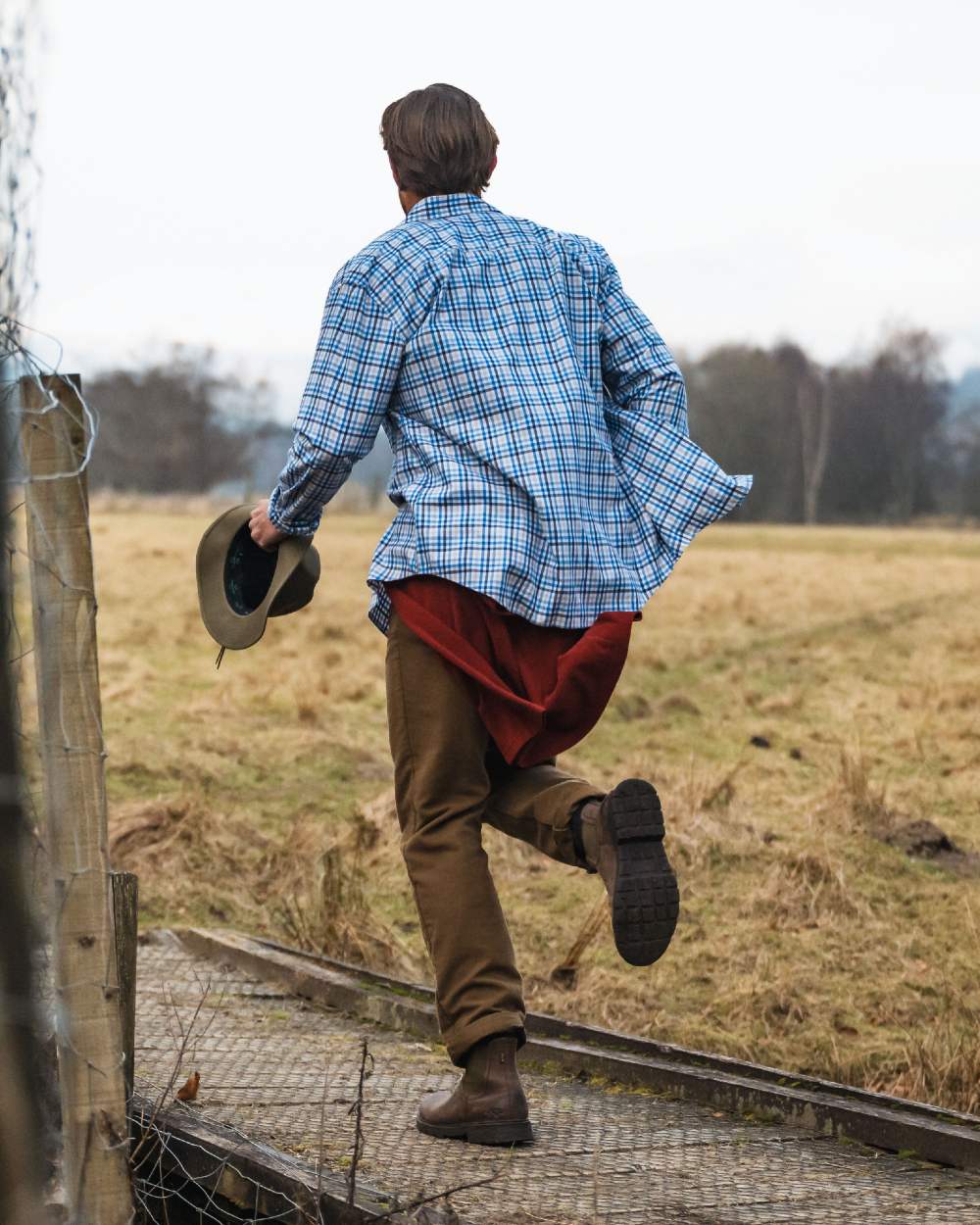 Dried Moss Coloured Hoggs of Fife Carrick Technical Stretch Moleskin Jeans on farm background