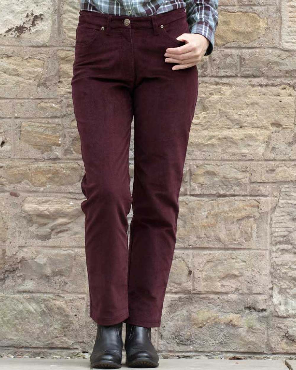 Merlot Coloured Hoggs of Fife Ceres Ladies Stretch Cord Jeans on wall background