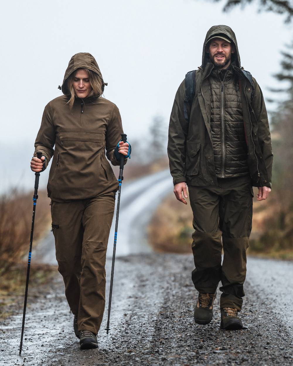 Fen Green Coloured Hoggs of Fife Culloden Waterproof Trousers on road background