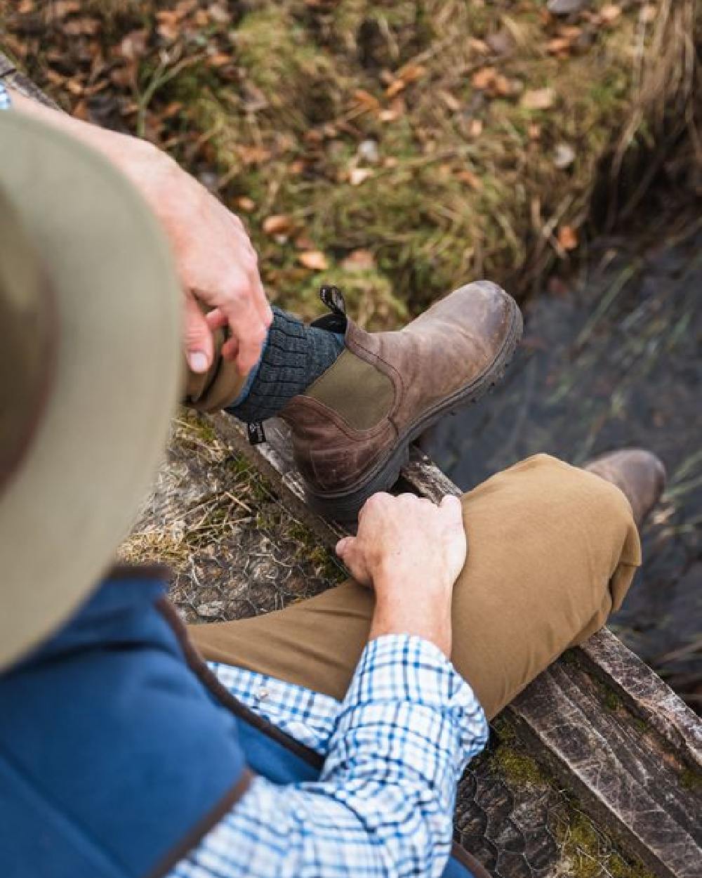 Dark Brown Coloured Hoggs of Fife Dalmeny Dealer Boots on pond background