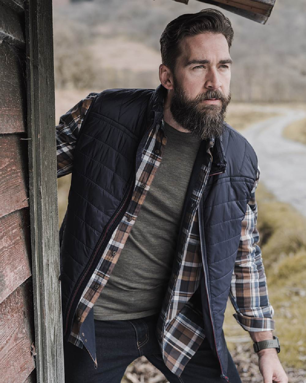 Black Red Coloured Hoggs of Fife Granite Rip-Stop Gilet on road background