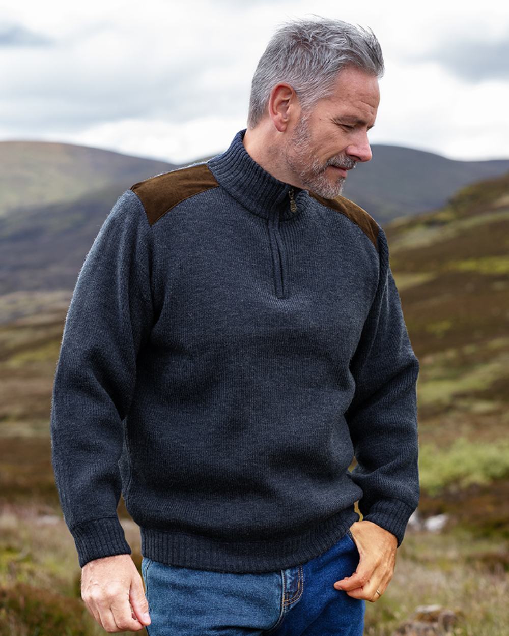 Storm Blue Coloured Hoggs of Fife Hebrides II Quarter Zip Windproof Pullover on mountain background