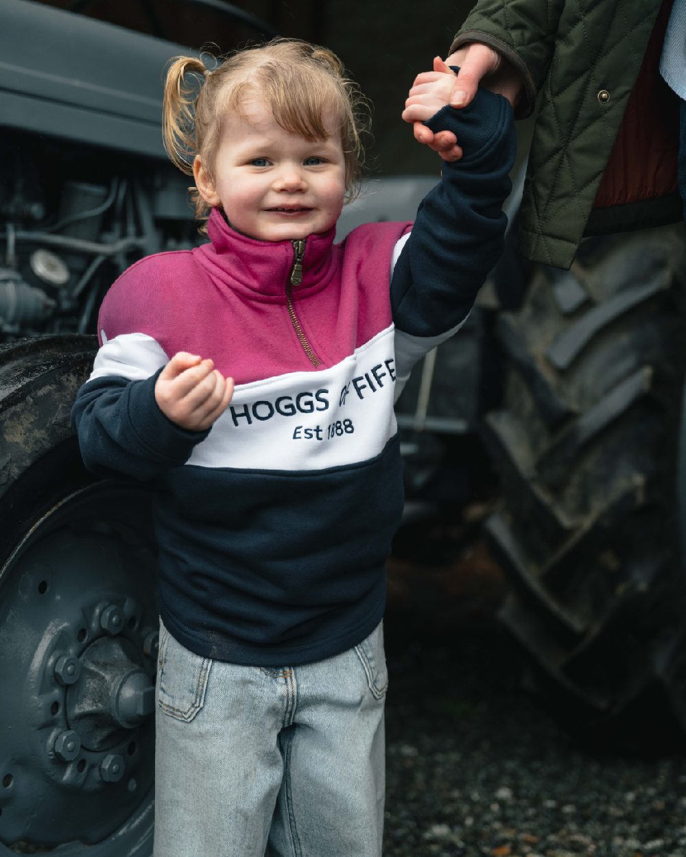 Berry White Navy coloured Hoggs of Fife Junior Dumfries 1888 Quarter Zip Top on outdoor background