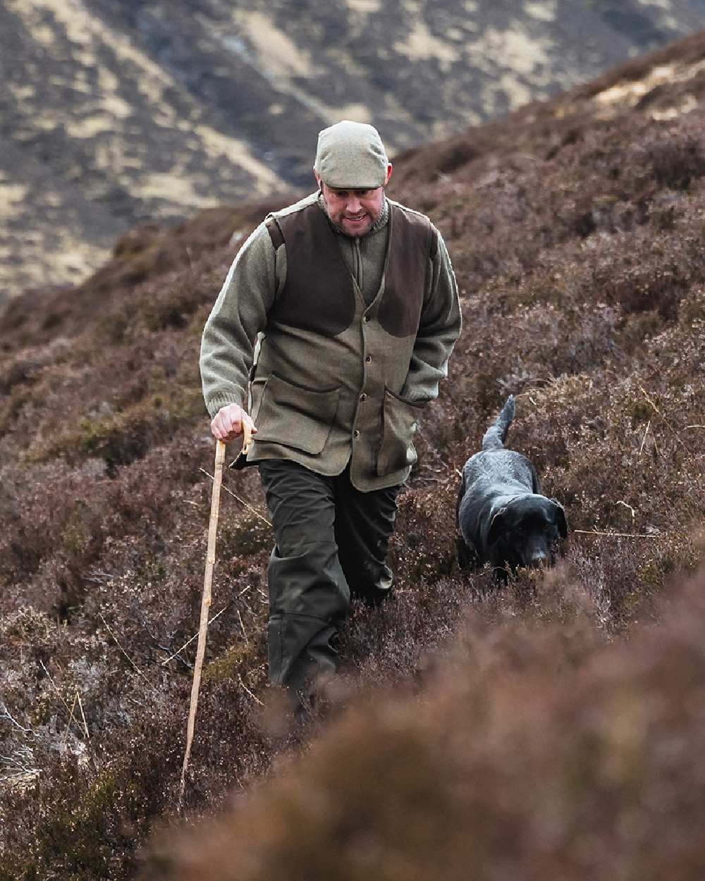 Autumn Bracken Coloured Hoggs of Fife Kinloch Technical Tweed Field Waistcoat on mountain background