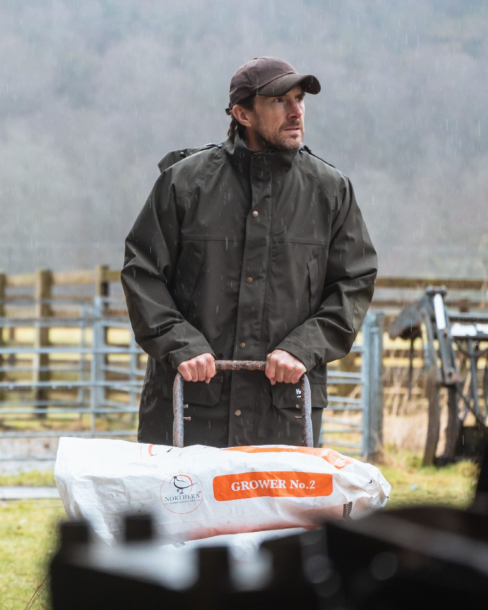 Brown Coloured Hoggs of Fife Leather Peak Waxed Baseball Cap on countryside background