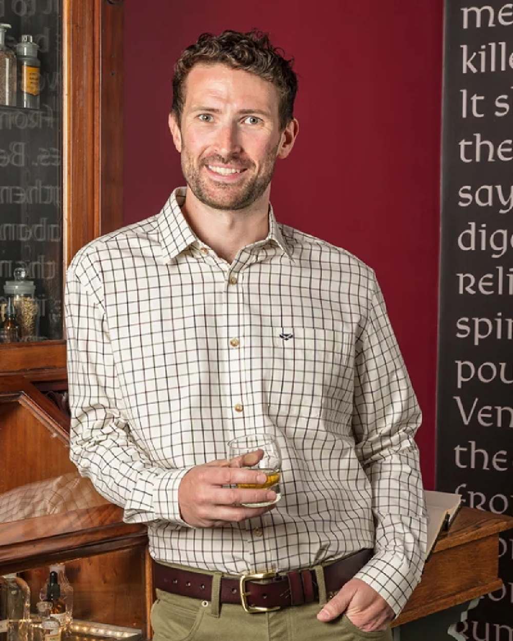 Dark Brown Coloured Hoggs of Fife Luxury Leather Belts on shop background