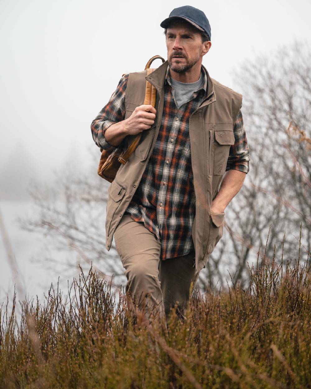 Khaki coloured Hoggs of Fife Mens Rothesay Utility Trousers on lake background