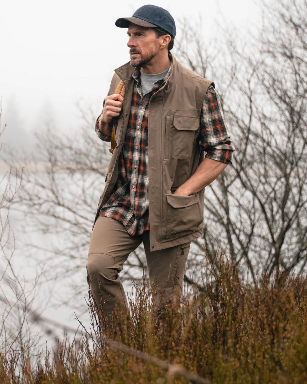 Khaki coloured Hoggs of Fife Mens Rothesay Utility Trousers on lake background