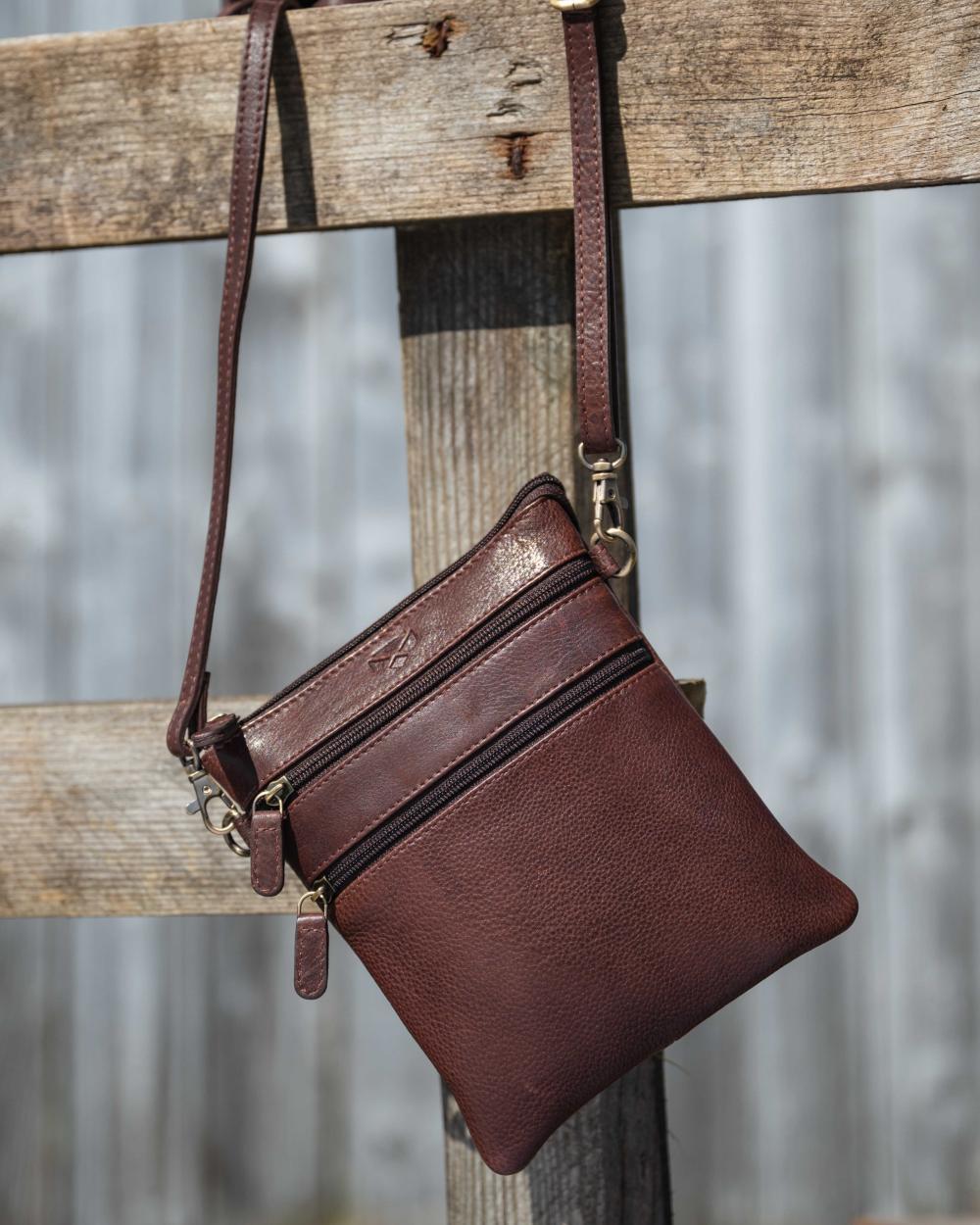 Conker Coloured Hoggs of Fife Monarch Leather Travel Organiser on outdoor background