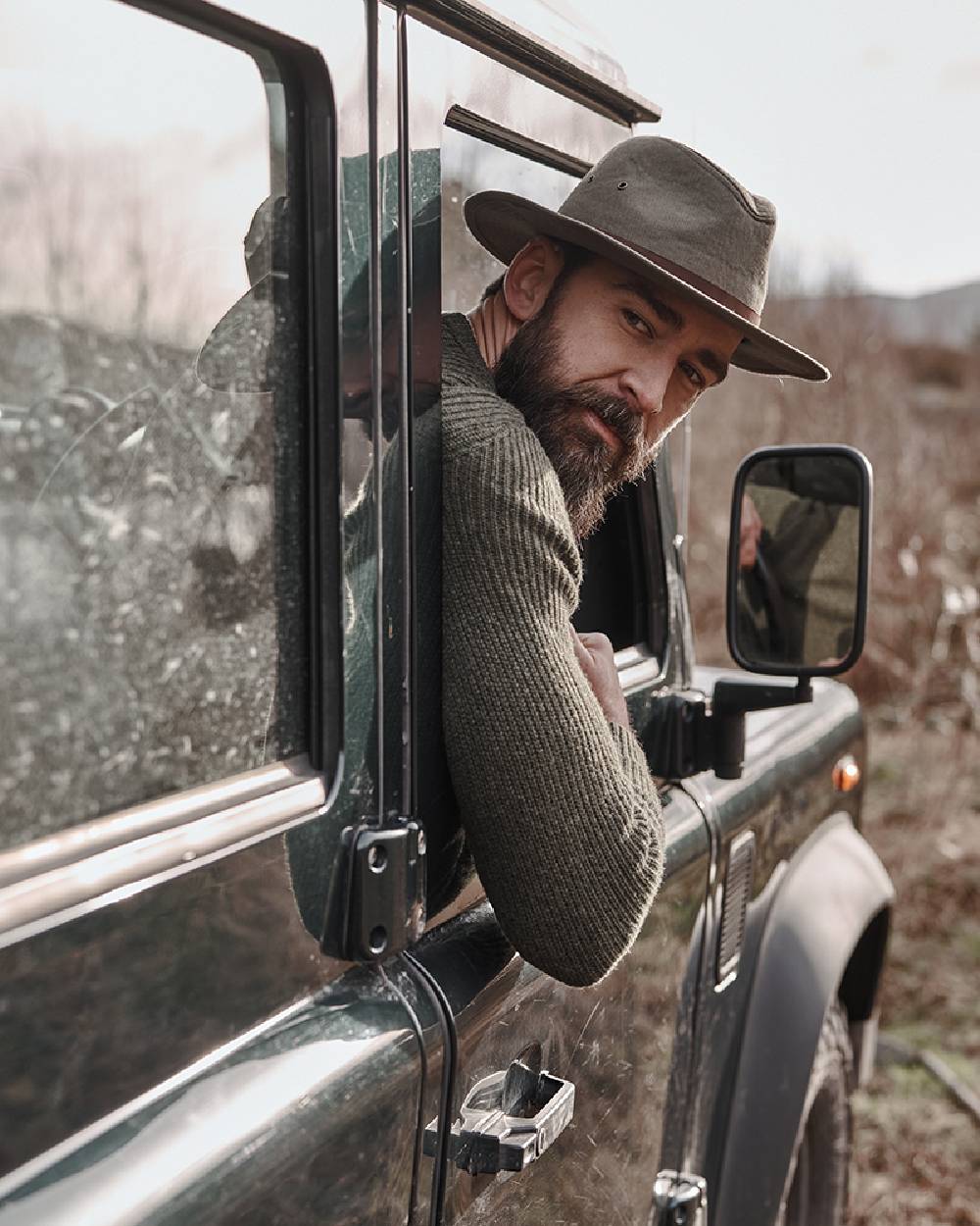 Khaki Coloured Hoggs of Fife Panmure Canvas Foldable Hat on car background