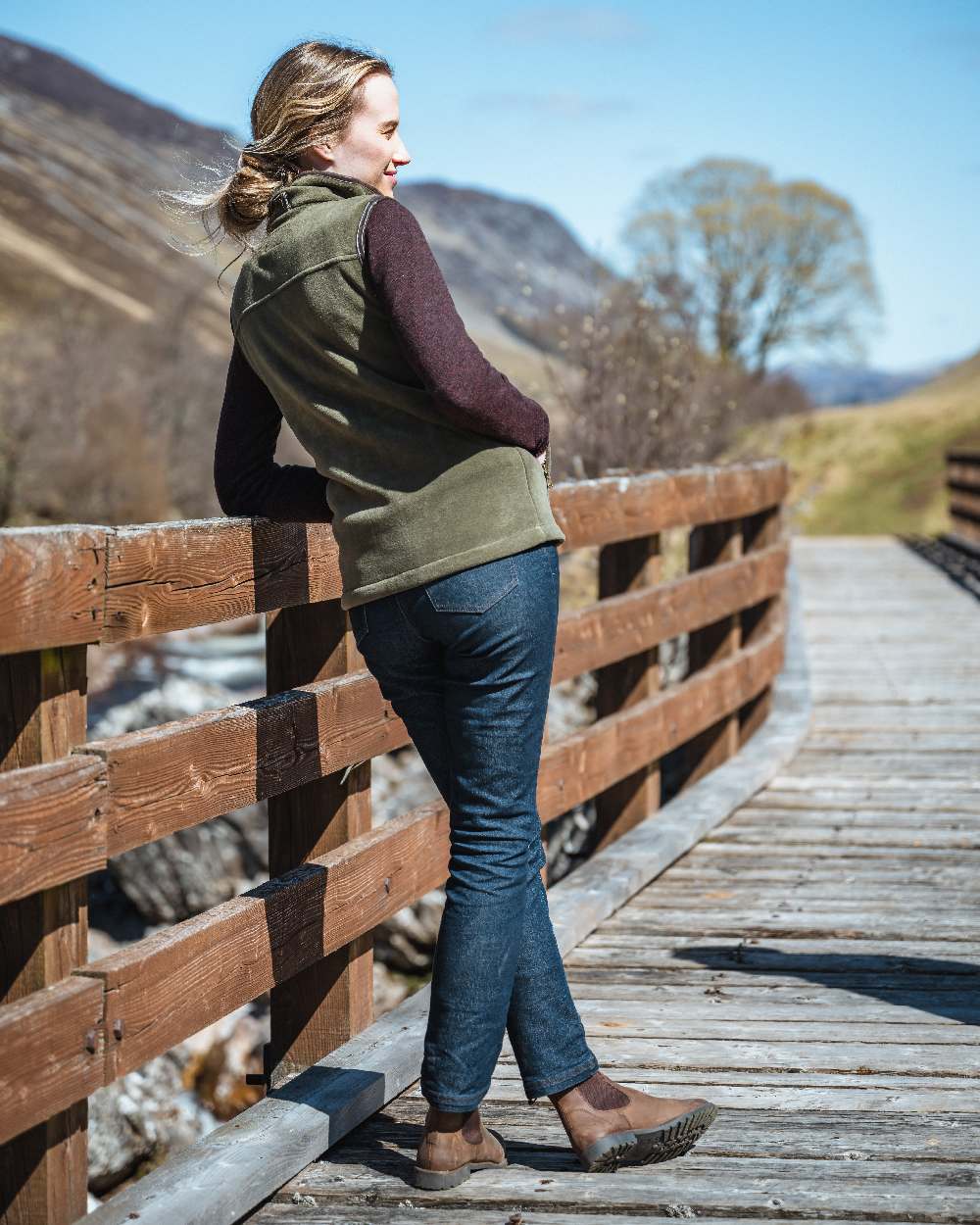Lovat Coloured Hoggs of Fife Stenton Ladies Fleece Gilet on bridge background