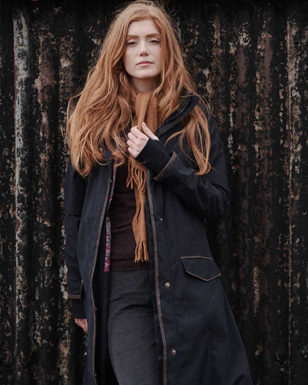 Navy Coloured Hoggs of Fife Struther Ladies Long Riding Coat on wall background