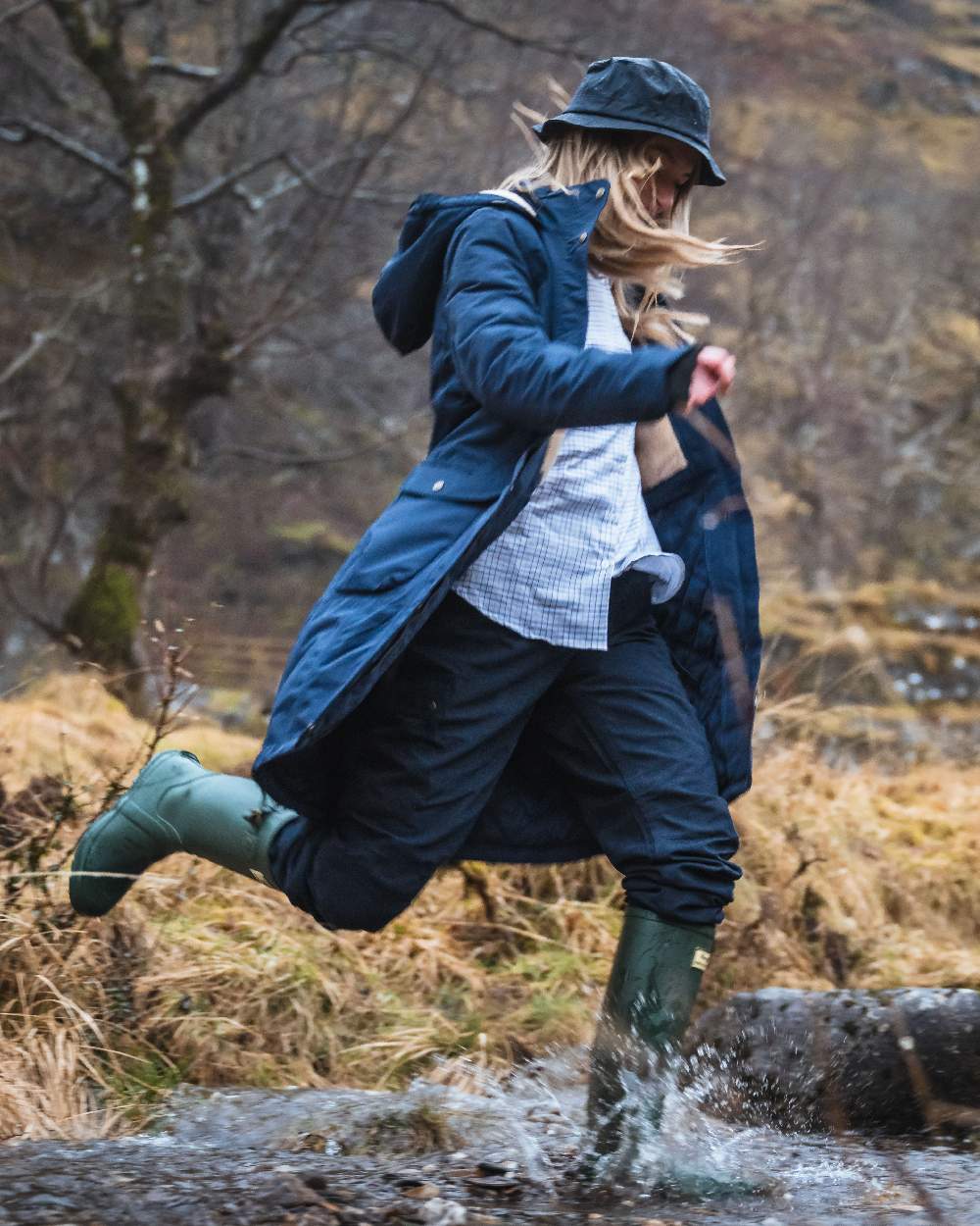 Navy Coloured Hoggs of Fife Waxed Bush Hat on forest background