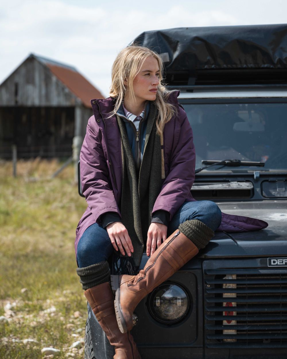 Black Berry Coloured Hoggs of Fife Womens Walker Long Coat on outdoor background