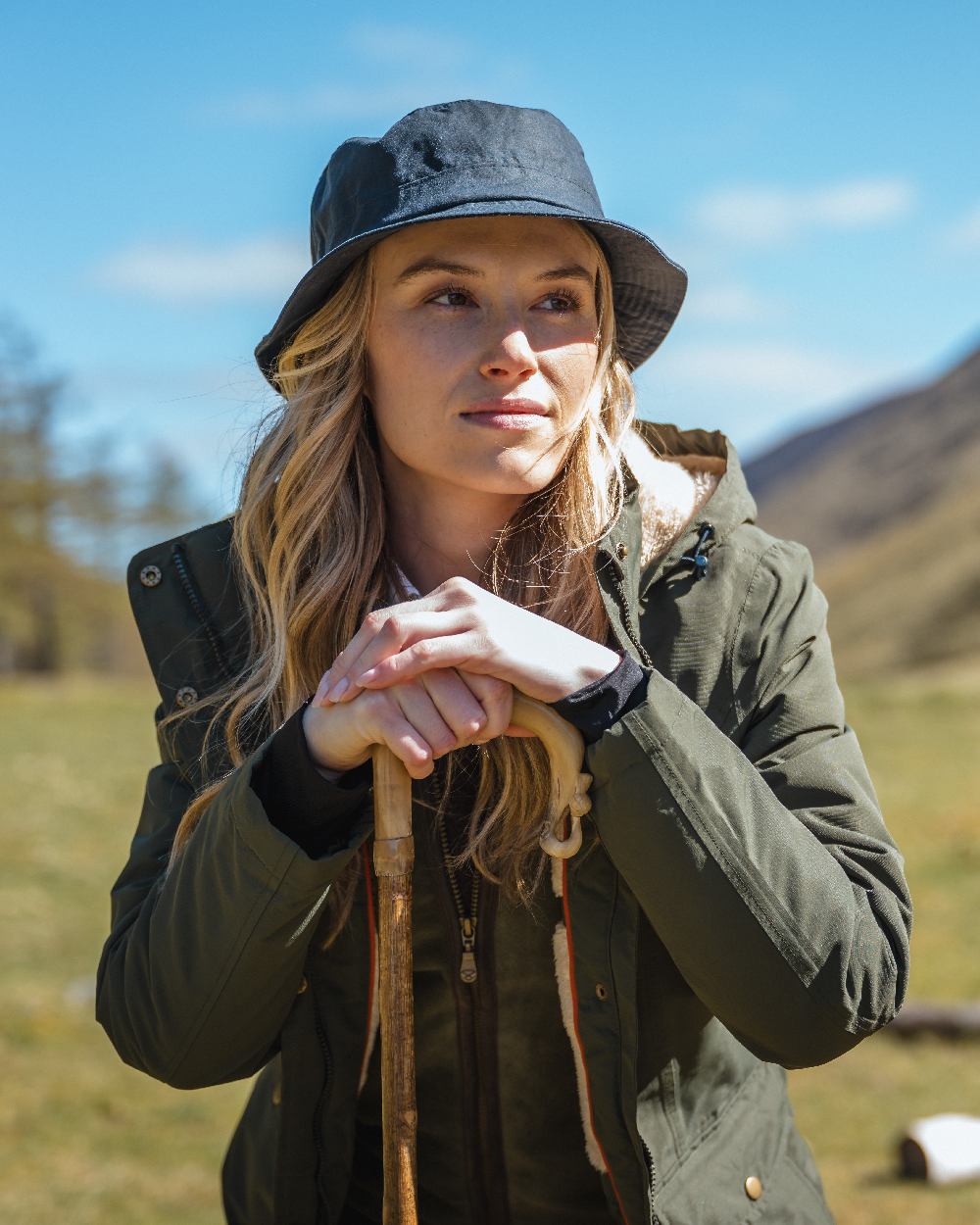 Green coloured Hoggs of Fife Womens Walker Long Coat on sky background