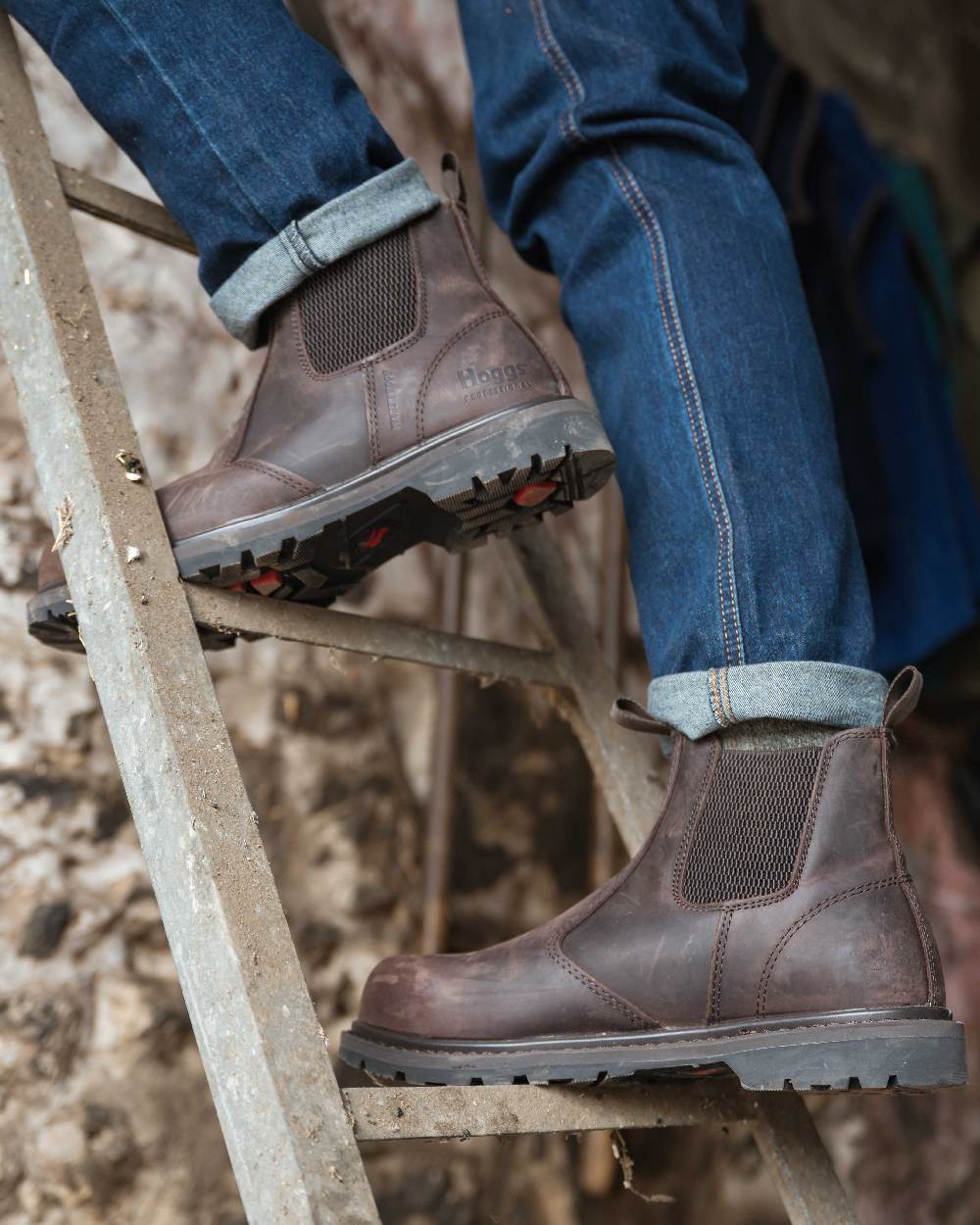 Crazy Horse Brown Coloured Hoggs of Fife Zeus Safety Dealer Boots on building background