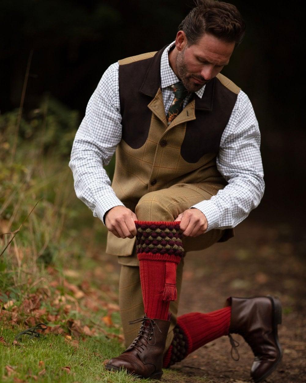 Chestnut coloured House of Cheviot Angus Socks on field background