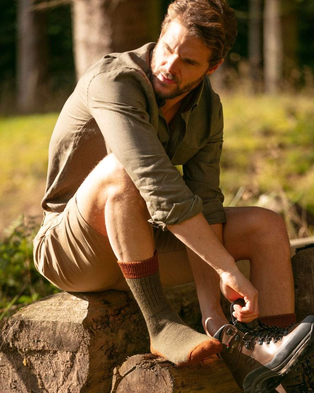 Bracken coloured House of Cheviot Glen Technical Socks on blurry background