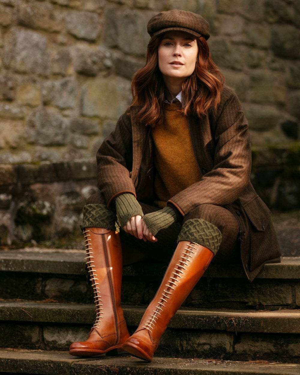 Dark Olive coloured House of Cheviot Lady Rannoch Socks on stairs background