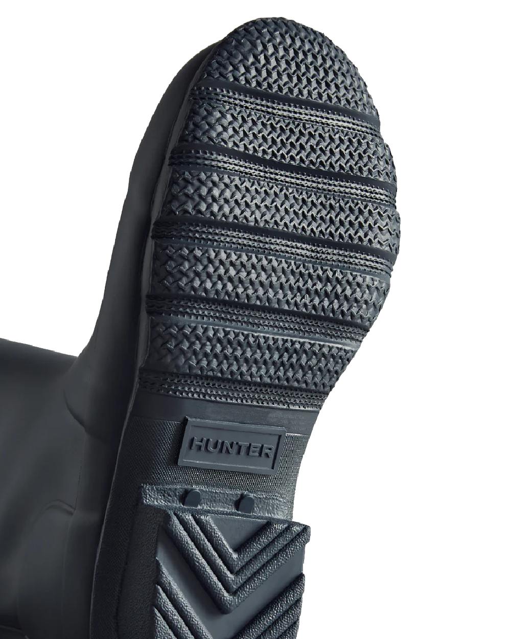 Navy coloured Hunter Big Kids Original Wellington Boots on white background