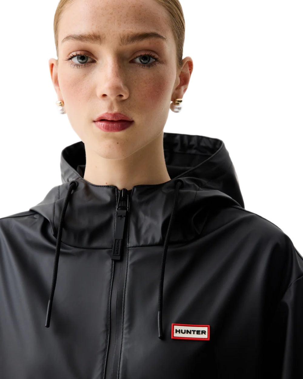 Black coloured Hunter Downpour Andrea PU Rain Coat on white background