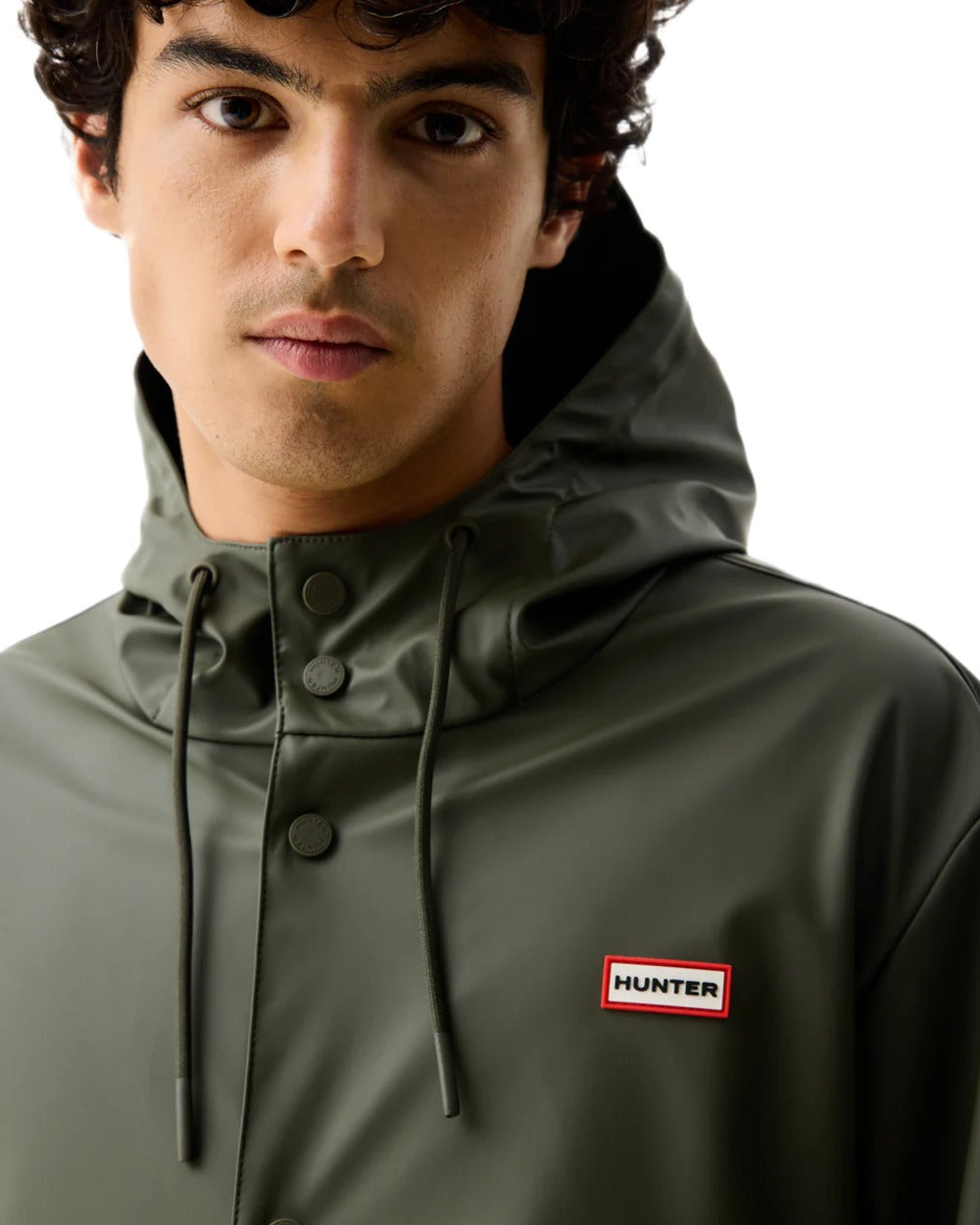 Kambaba Green coloured Hunter Downpour Jo Pu Rain Parka on white background