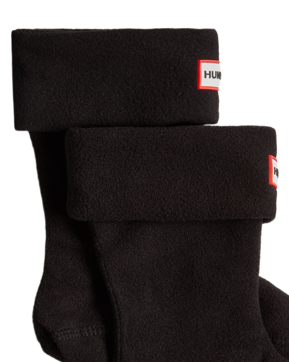 Black coloured Hunter Kids Recycled Fleece Cuff Boot Socks on white background