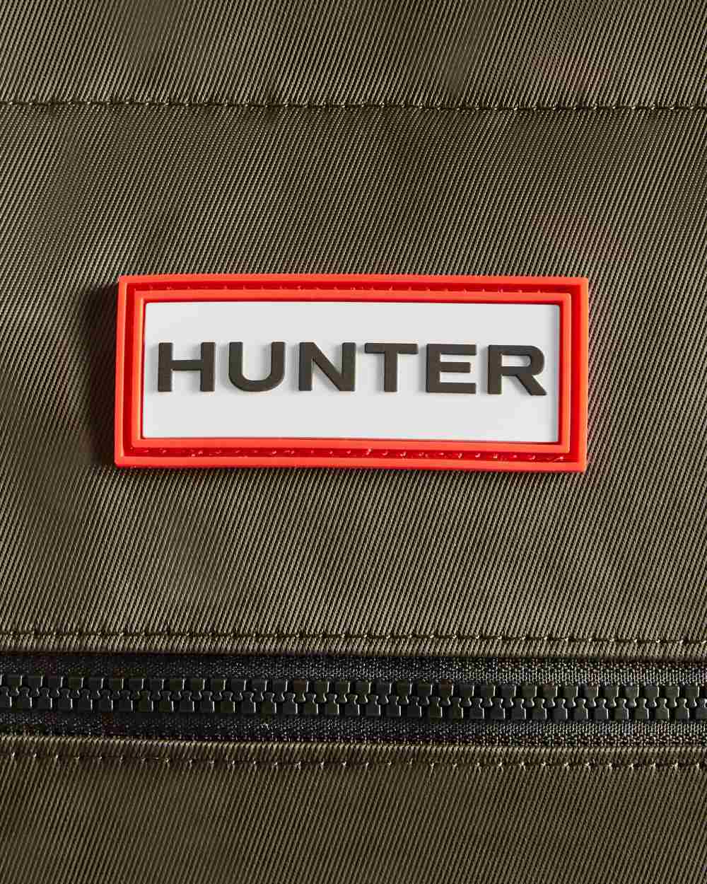Dark Olive coloured Hunter Nylon Midi Topclip Tote Bag on white background