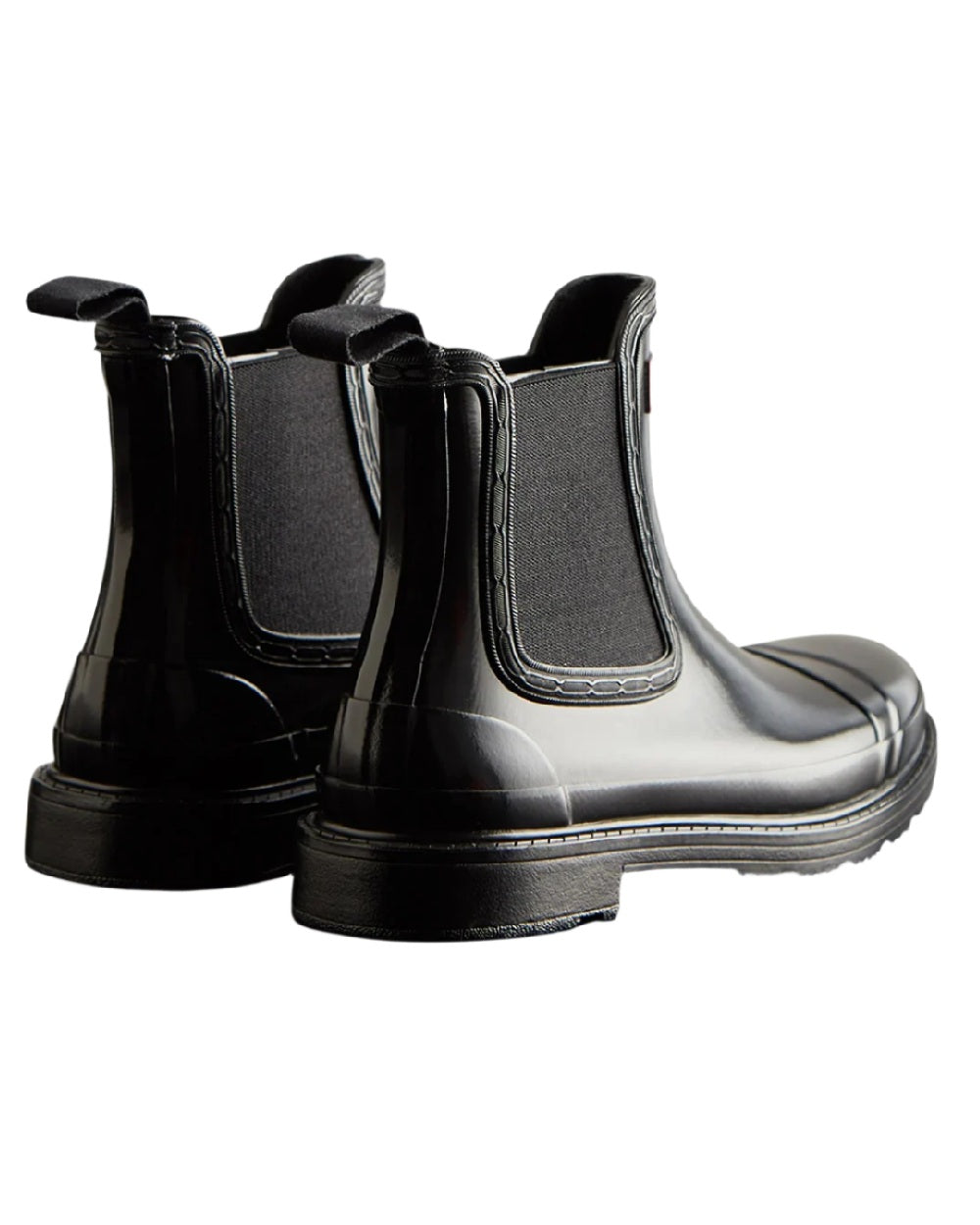Black coloured Hunter Womens Commando Gloss Chelsea Boots on white background