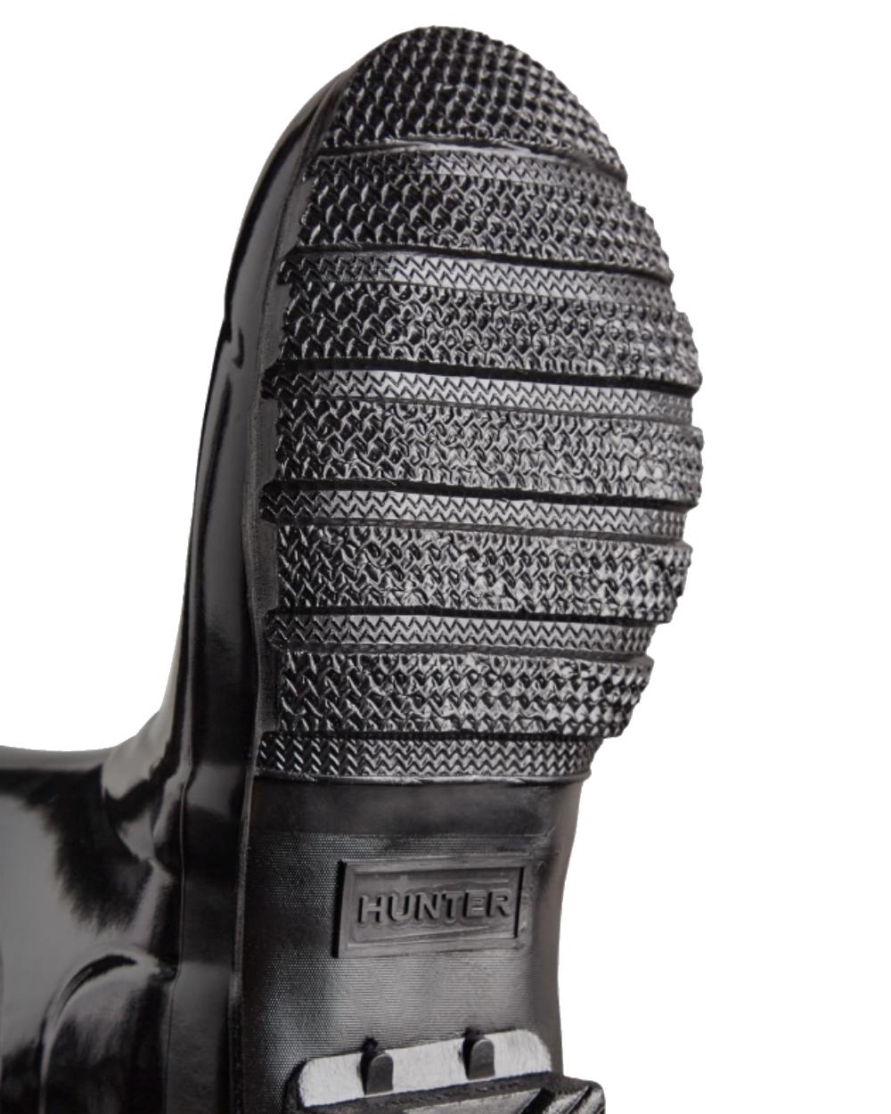 Black coloured Hunter Womens Original Tall Gloss Wellington Boots on white background