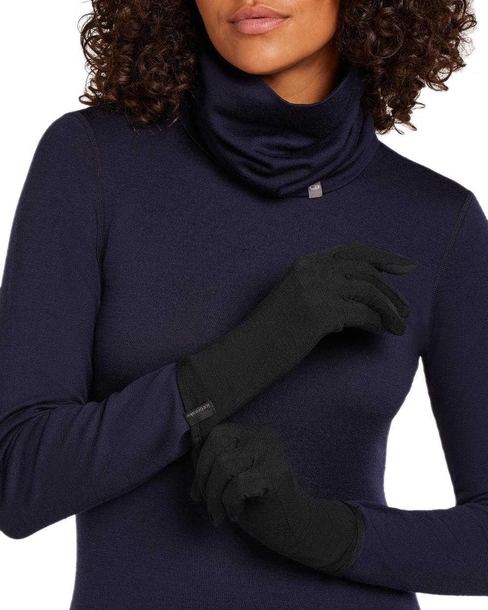 Black Coloured Icebreaker 260 Tech Glove Liners on white background