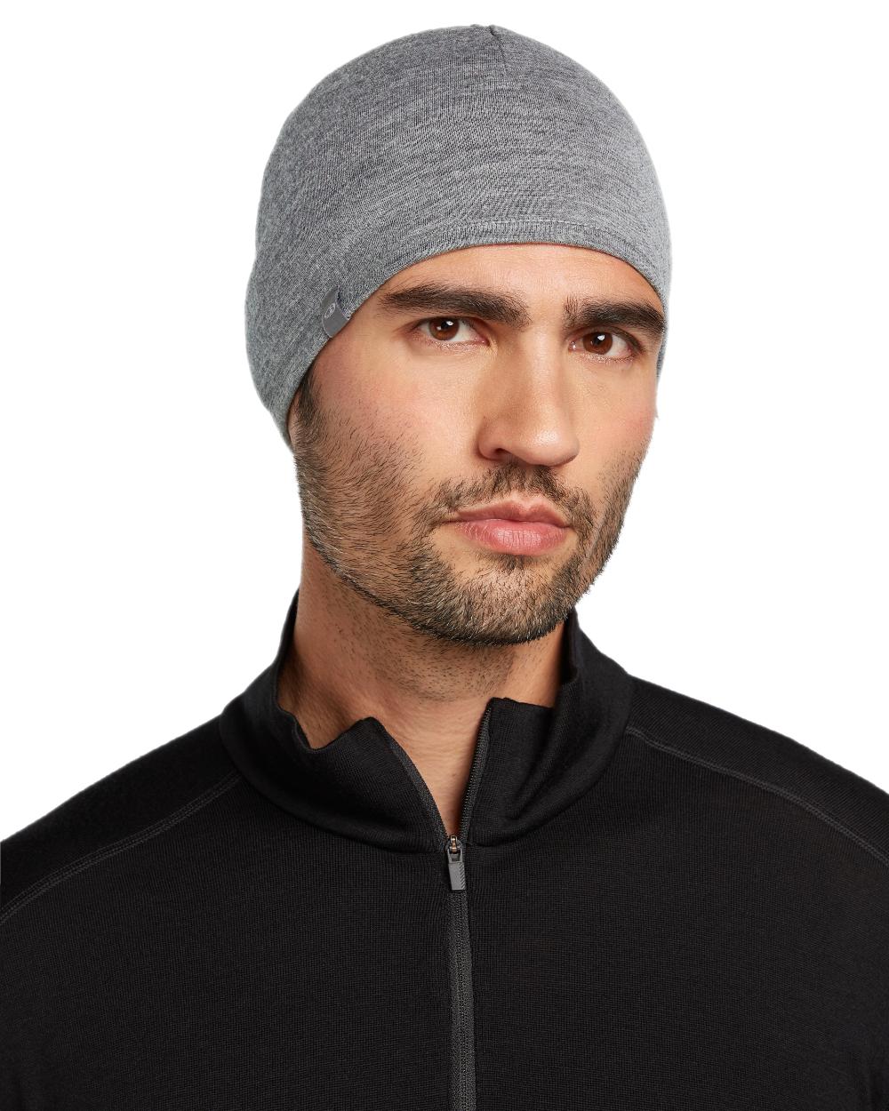Black Gritstone Heather Coloured Icebreaker Merino 200 Pocket Hat on white background
