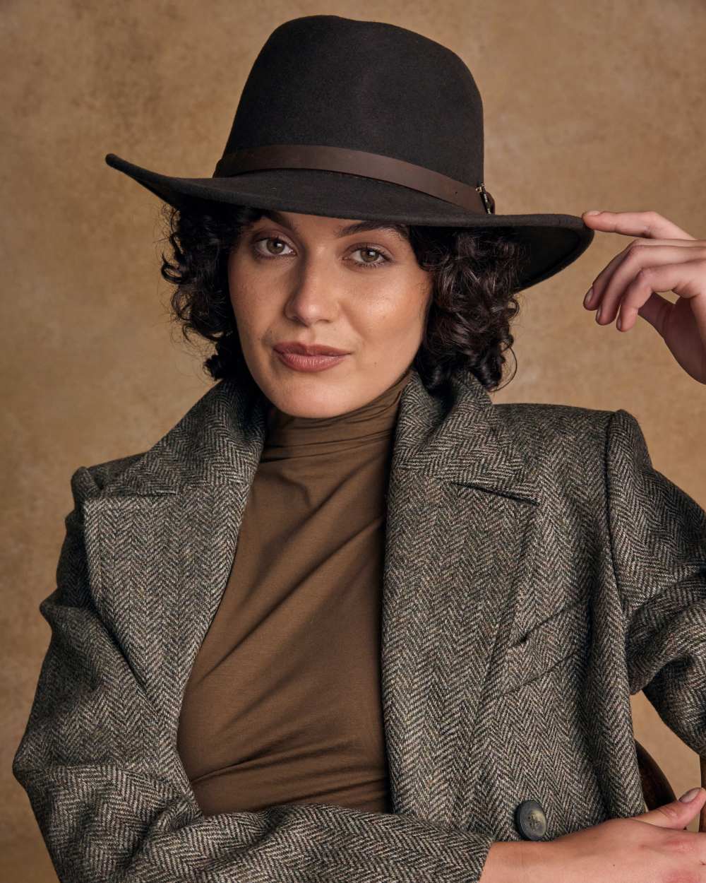 Brown Coloured Jack Murphy Boston Crushable Felt Hat on indoor background