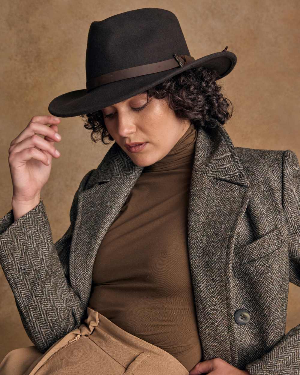 Brown Coloured Jack Murphy Boston Crushable Felt Hat on indoor background