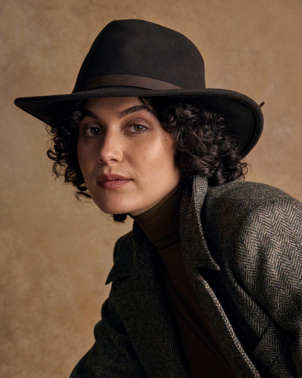 Brown Coloured Jack Murphy Boston Crushable Felt Hat on indoor background