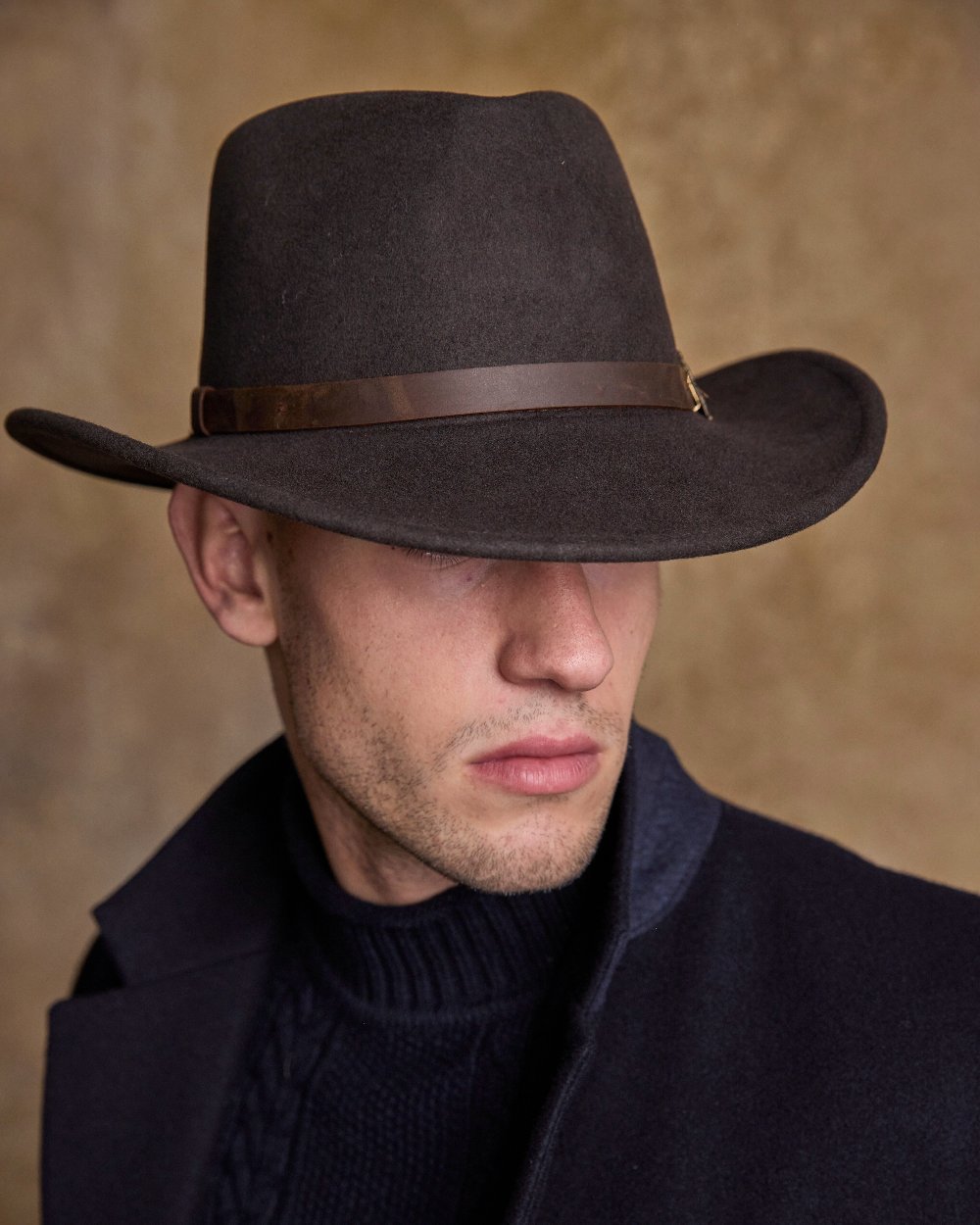 Brown Coloured Jack Murphy Boston Crushable Felt Hat on indoor background